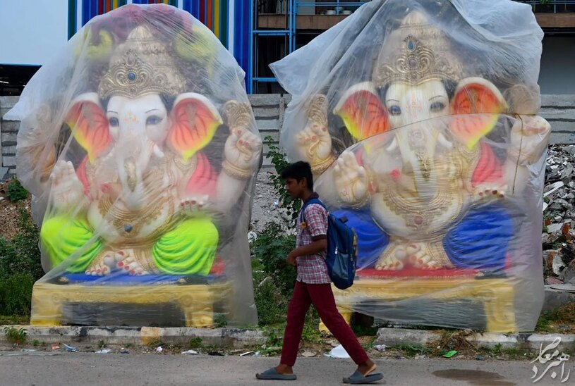 عکس / آماده کردن مجسمه خدای هندو در حیدرآباد هند