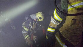 نجات ۳۰ نفر از میان دود و آتش در مجتمع مسکونی شهرری