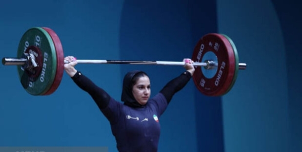 ریحانه کریمی دختر وزنه بردار ایران در دوضرب و مجموع مدال برنز گرفت