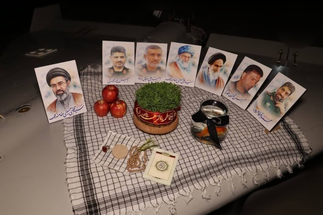 عکس/ سفره هفت‌سین نیرو‌های هوافضای سپاه بر روی بال پهپاد انتحاری شاهد