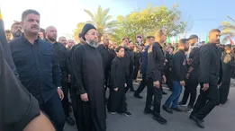 حضور عمار حکیم در مراسم تشییع امام شهید در نجف